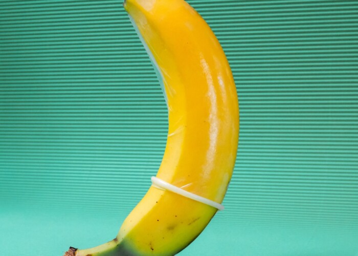 yellow banana fruit on green textile