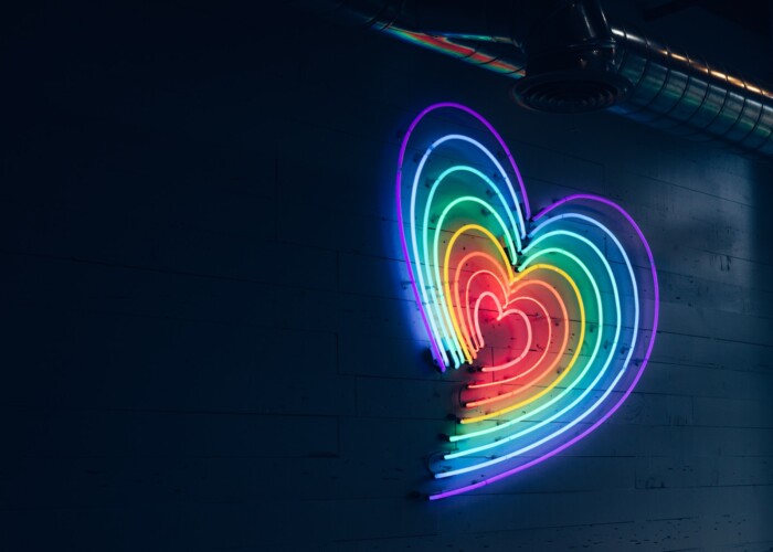 multicolored heart LED light on wall